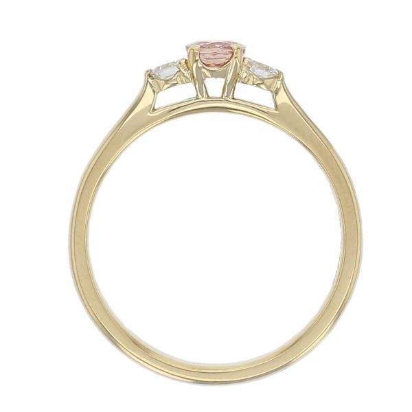 18ct yellow gold round brilliant cut diamond & oval cut pink peach sapphire trilogy ring designer three stone dress ring handmade by Faller, hand crafted, precious jewellery, jewelry, ladies , woman