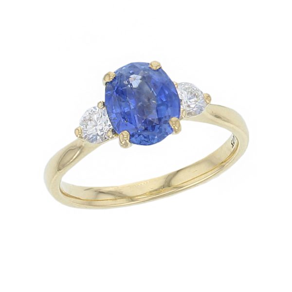 alternative engagement ring, 18ct yellow gold round brilliant cut diamond & oval cut blue sapphire trilogy ring designer three stone dress ring handmade by Faller, hand crafted, precious jewellery, jewelry, ladies , woman
