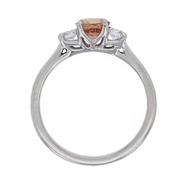 alternative engagement ring, platinum round peach sapphire & brilliamt cut diamond trilogy ring designer three stone dress ring handmade by Faller, hand crafted, precious jewellery, jewelry, ladies , woman