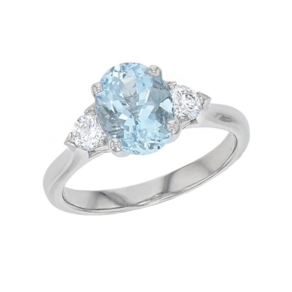 aquamarine, diamond 18ct yellow gold. platinum trilogy ring