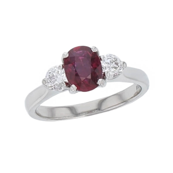 alternative engagement ring, platinum, ladies ring. oval cut ruby & diamond designer three stone engagement ring designed & hand crafted by Faller of Derry/ Londonderry, dress ring, precious gem jewellery, jewelry, trilogy, ruby ring, red gem ring