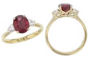 alternative engagement ring, 18ct yellow gold round brilliant cut diamond & oval cut red spinel trilogy ring designer three stone dress ring handmade by Faller, hand crafted, precious jewellery, jewelry, ladies , woman