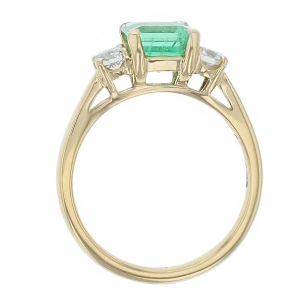 alternative engagement ring, 18ct yellow gold ladies octagon cut emerald & diamond designer trilogy engagement ring designed & hand crafted by Faller of Derry/ Londonderry, trilogy dress ring, precious green gem jewellery, jewelry